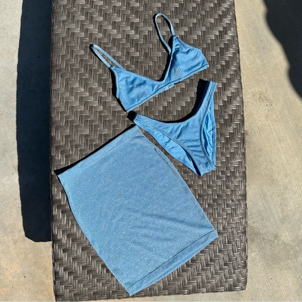 LAST CHANCE! 
Blue sparkle bikini and skirt set